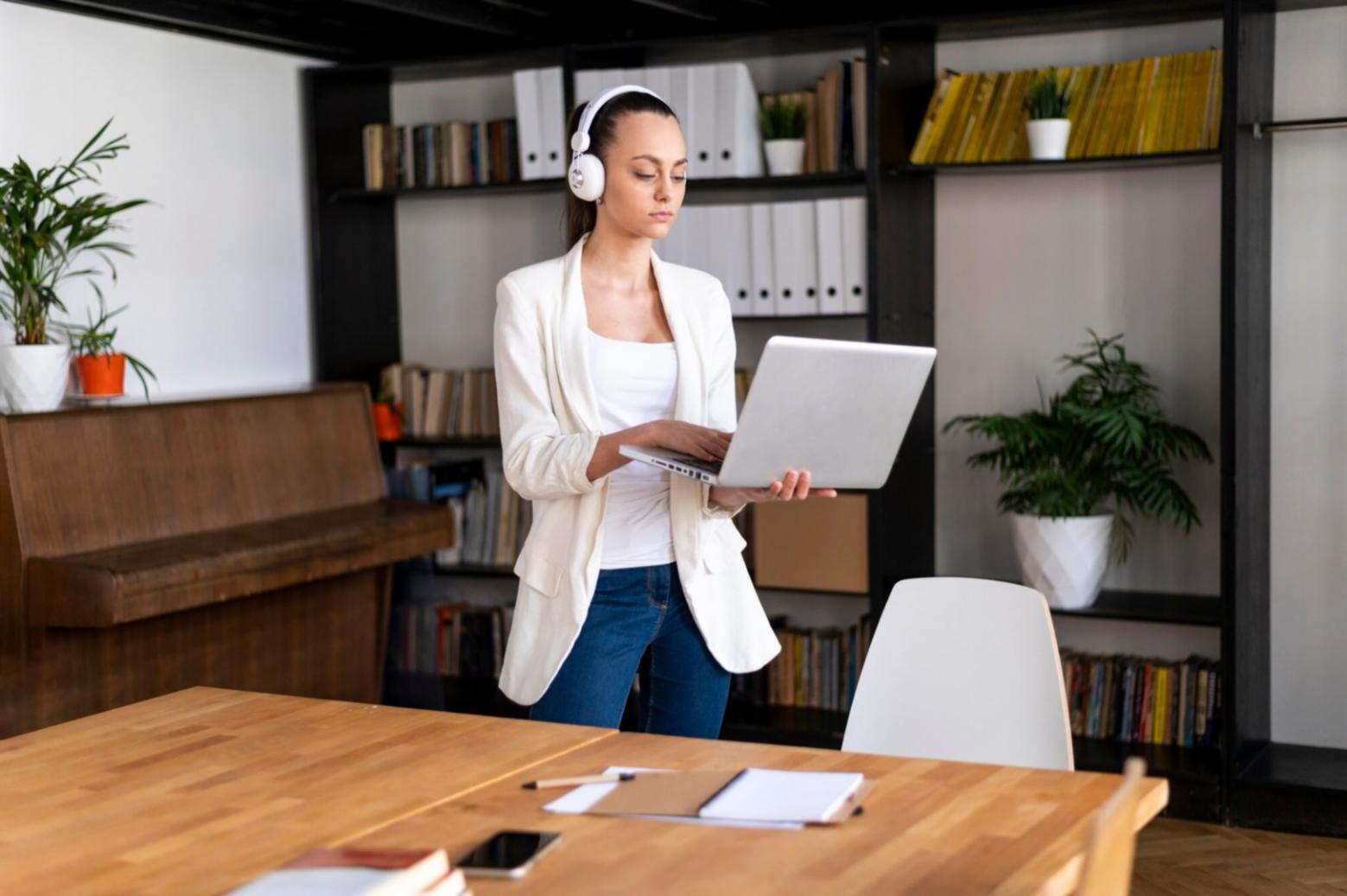 Financial analyst reviewing complex market data and industry reports on multiple screens